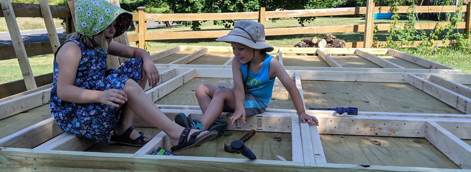 Babies building a shed