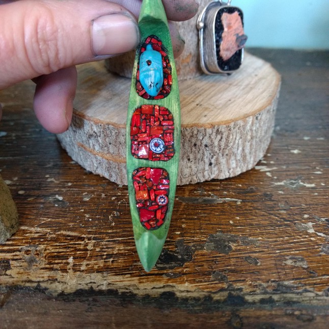 Photo of Tiny hand-carved canoes