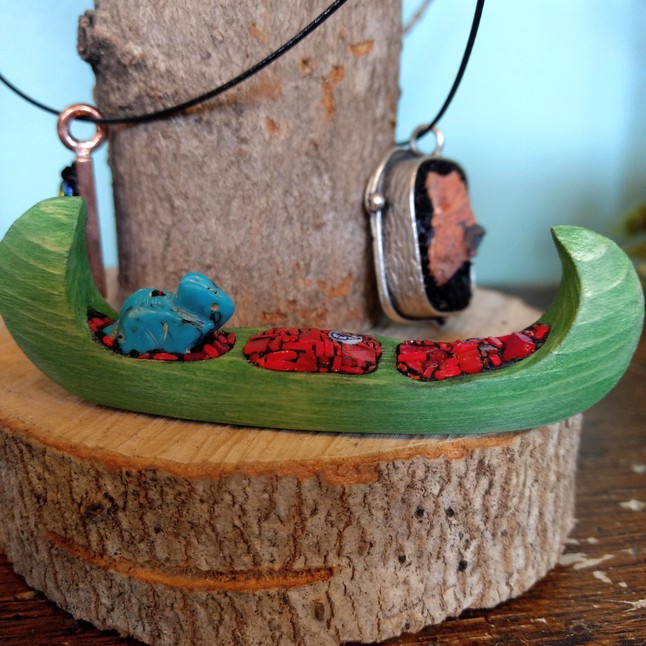 Photo of Tiny hand-carved canoes